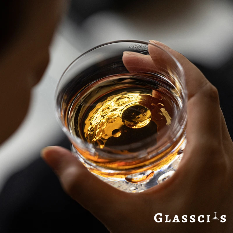 Heavy bottom whiskey glass inspired by lunar beauty