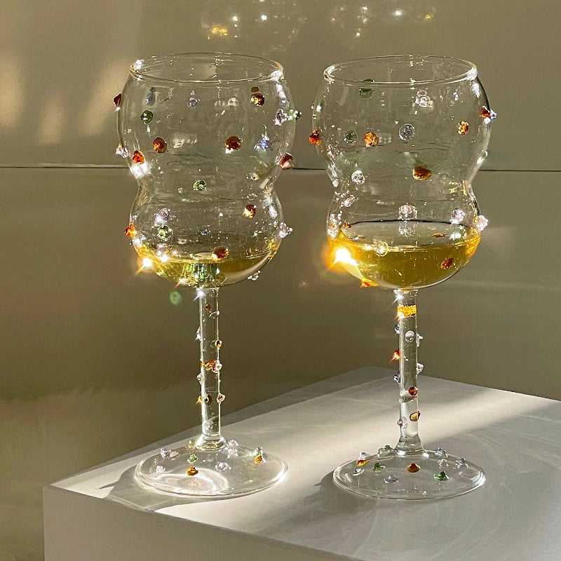Colorful gem decorated sparkling wine glass