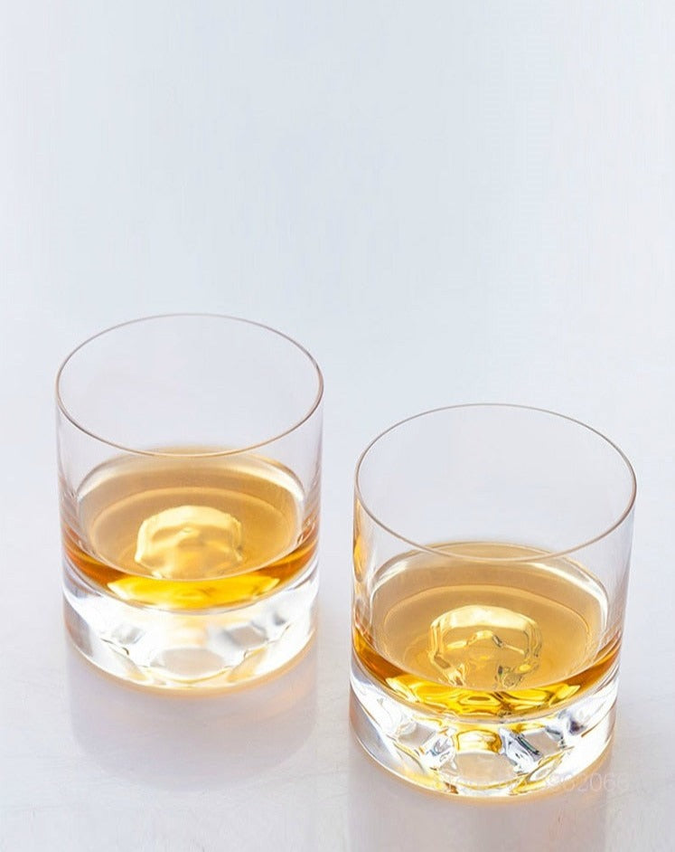hand blown whiskey glass with skull face on bottom