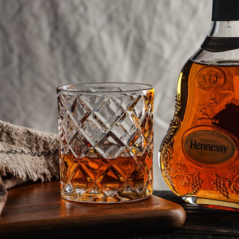 on the rocks glass with a golden whiskey pour