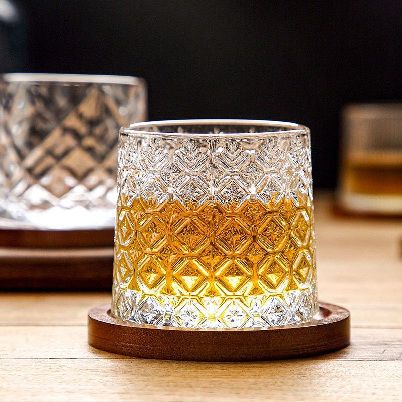 Stylish whiskey glass adorned with snowflakes, perfect for a cozy evening