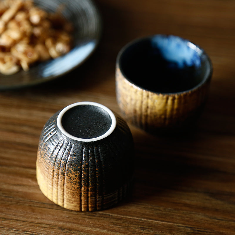 ceramic sake cups with wooden-like design