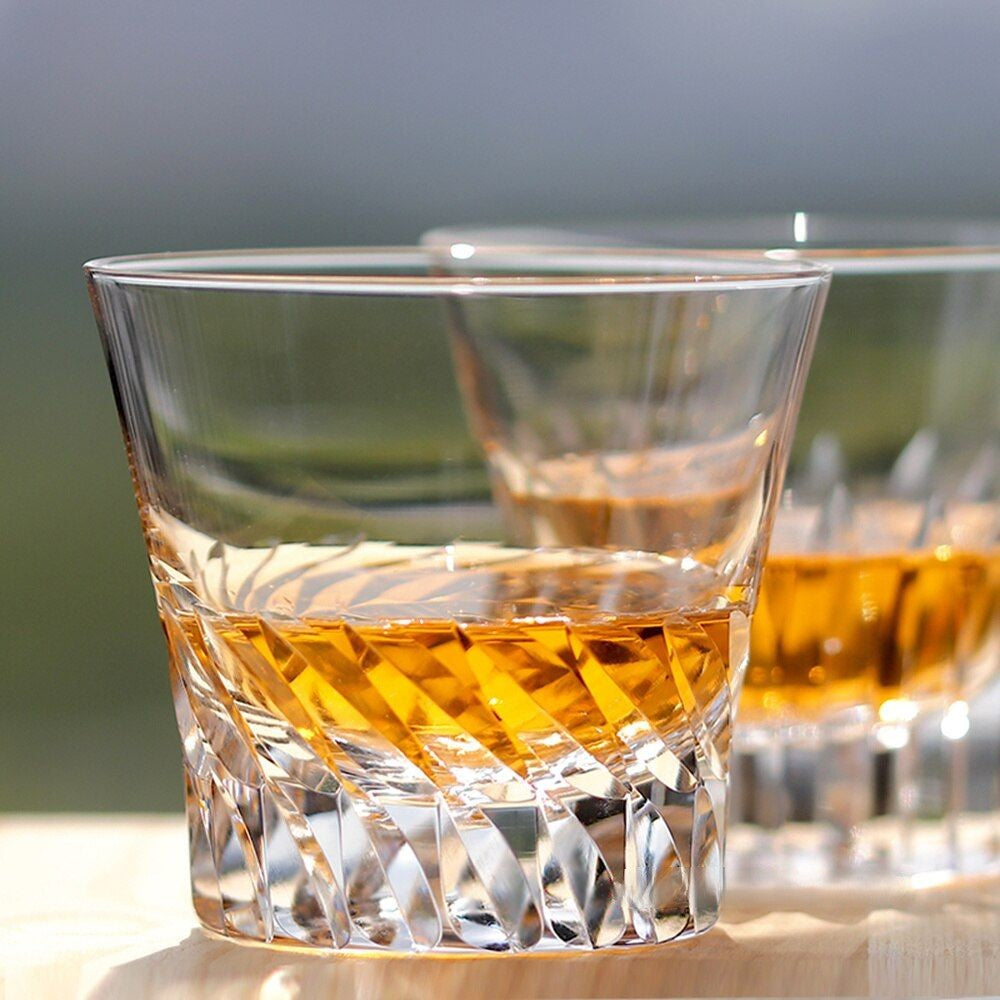Whiskey glass with beautiful angelic wing motifs