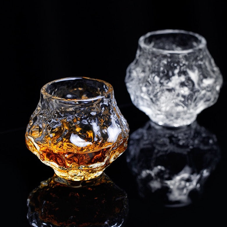 Meteorite Whiskey Glass shimmering under party lights