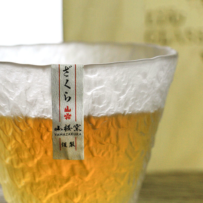 Hazy finish on elegant whiskey glass