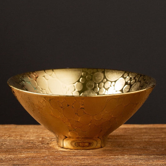 Artistic gold sakazuki sake cup with polka dots