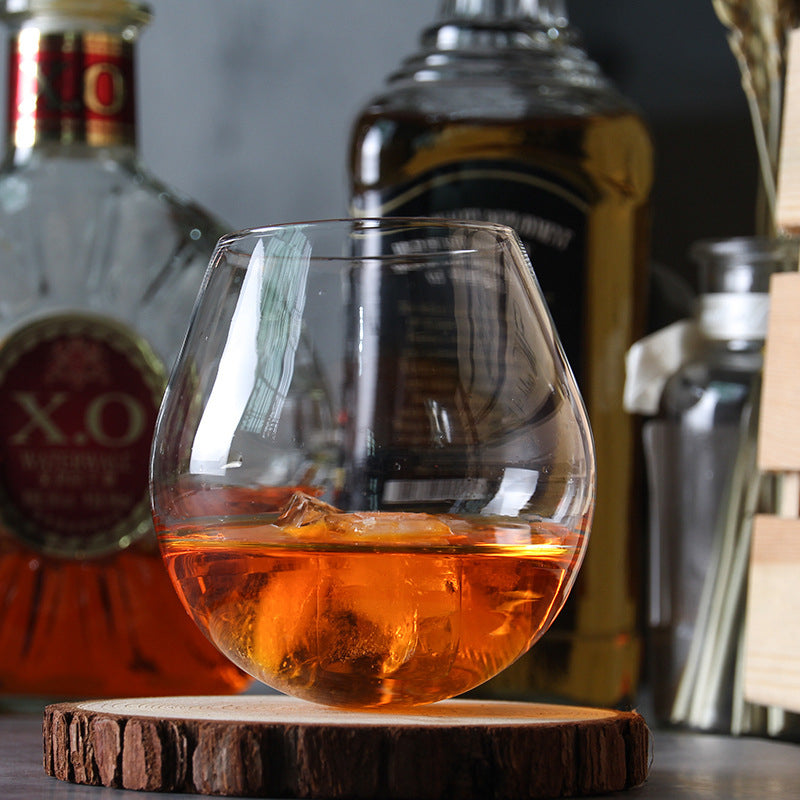Elegant Roly Poly Rocking Whiskey Glass with a minimalist design