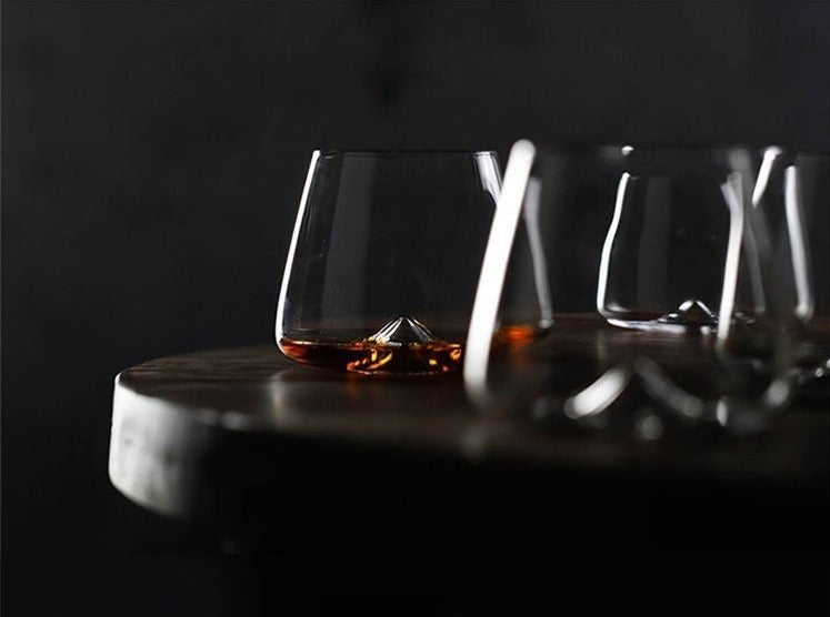 Sleek Minimalist Whiskey Peaks Glass with distinctive mountain-shaped base
