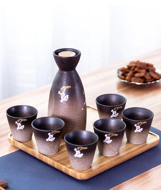 Hand-painted sake ceramic set with cherry blossom design