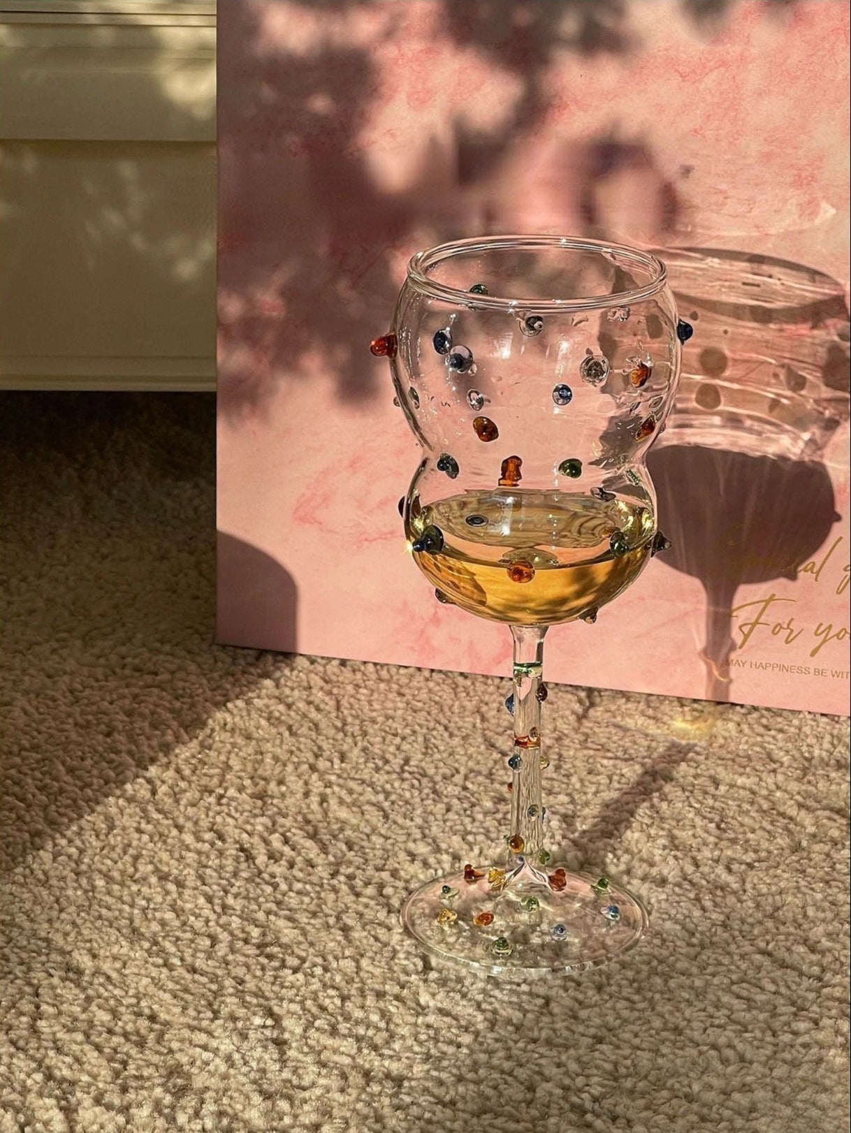 Unique Christmas light adorned wine glasses