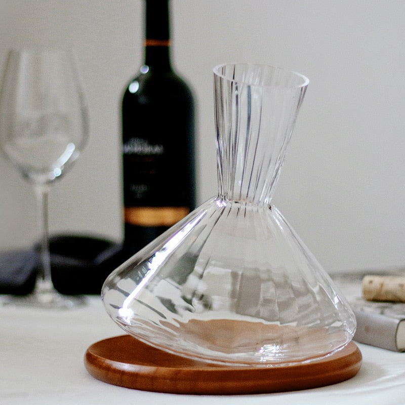 Discover the charm of our wood-supported rotating decanter