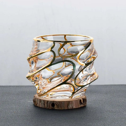 golden glassware with wave design