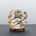 golden glassware with wave design