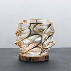 golden glassware with wave design