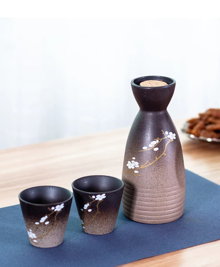 Artisanal cherry blossom ceramic sake set for collectors