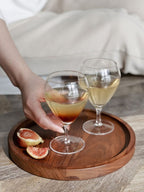 Aesthetic champagne glasses with short stems.