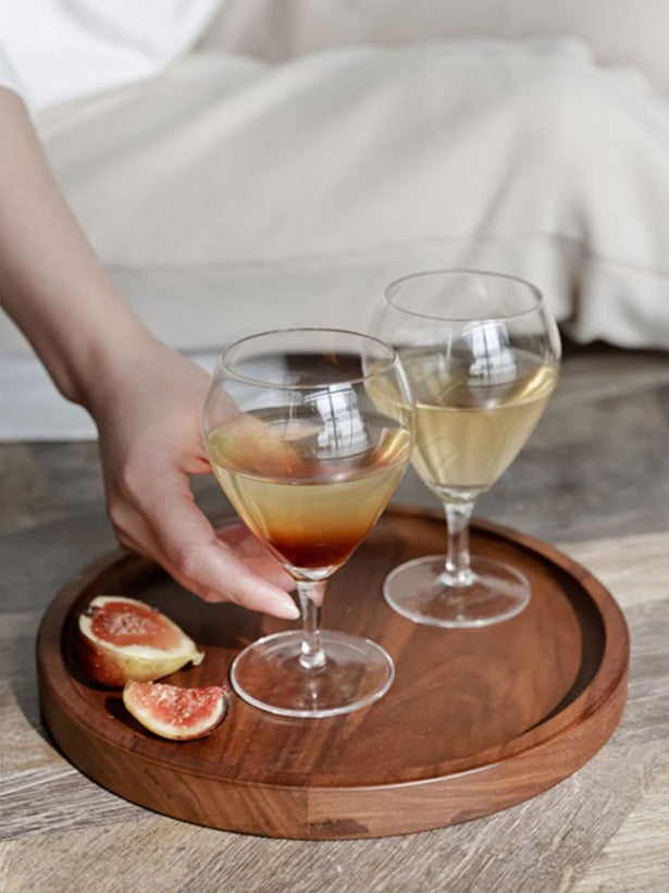 Aesthetic champagne glasses with short stems.