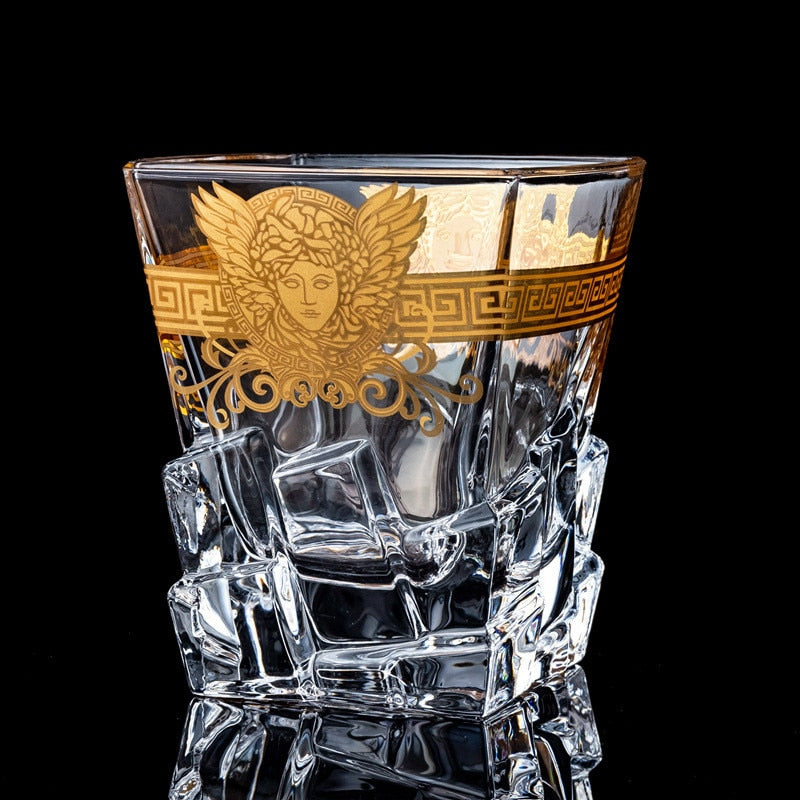 Medusa-designed greek whiskey glass with gold riim