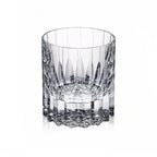 Hand-cut crystal whiskey glass with vertical cuts and a star-cut base