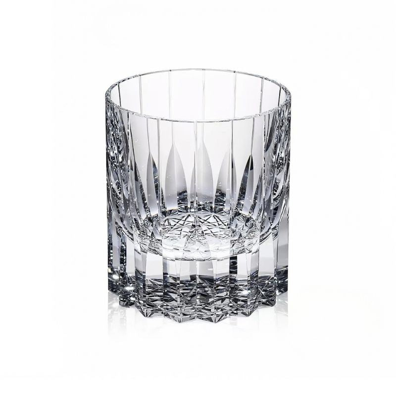 Hand-cut crystal whiskey glass with vertical cuts and a star-cut base