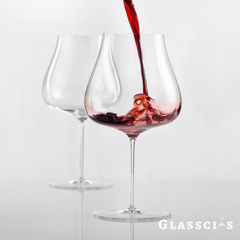 pouring red wine into sensory wine glasses