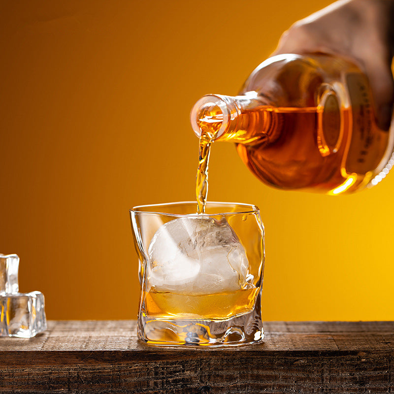 whiskey glass with golden rim