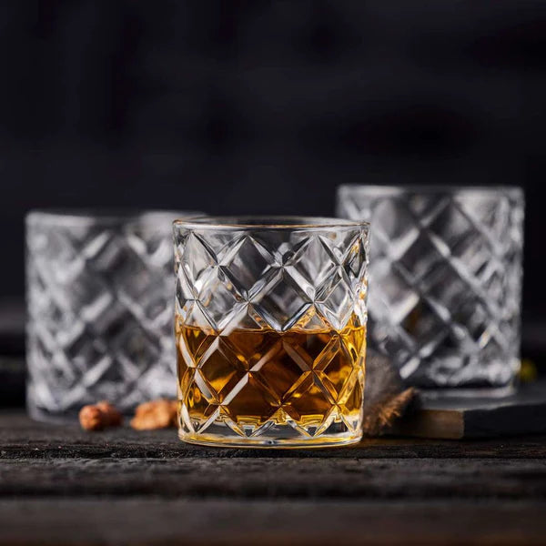 An array of premium whiskey rocks glass on display.
