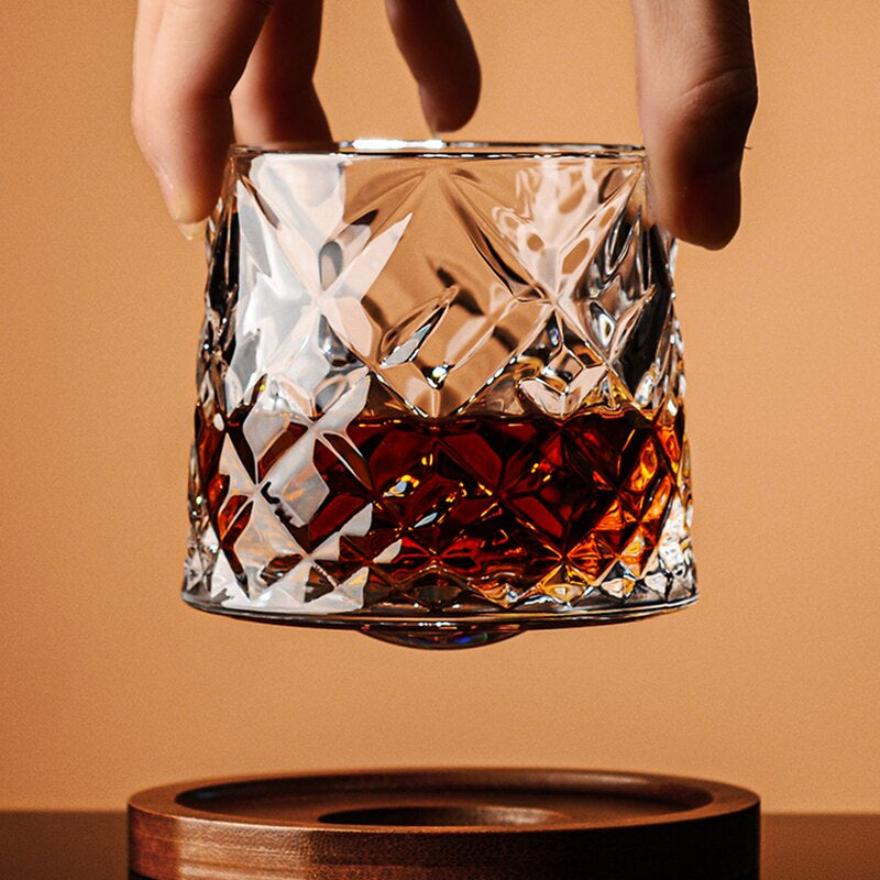 Luxurious diamond-textured rocking whiskey glass in refined ambiance
