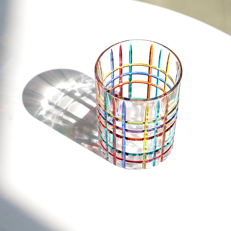colored whiskey glass with shadow | Glasscias