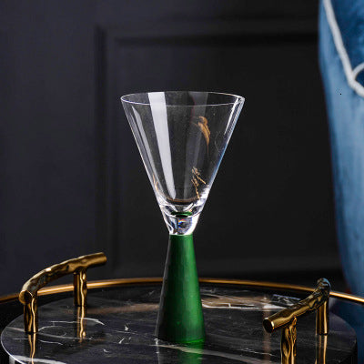 Modern goblet wine glass with emerald base