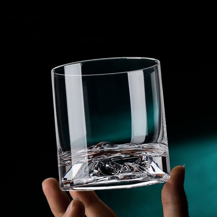 Luxurious clear whiskey glass with mountain bottom