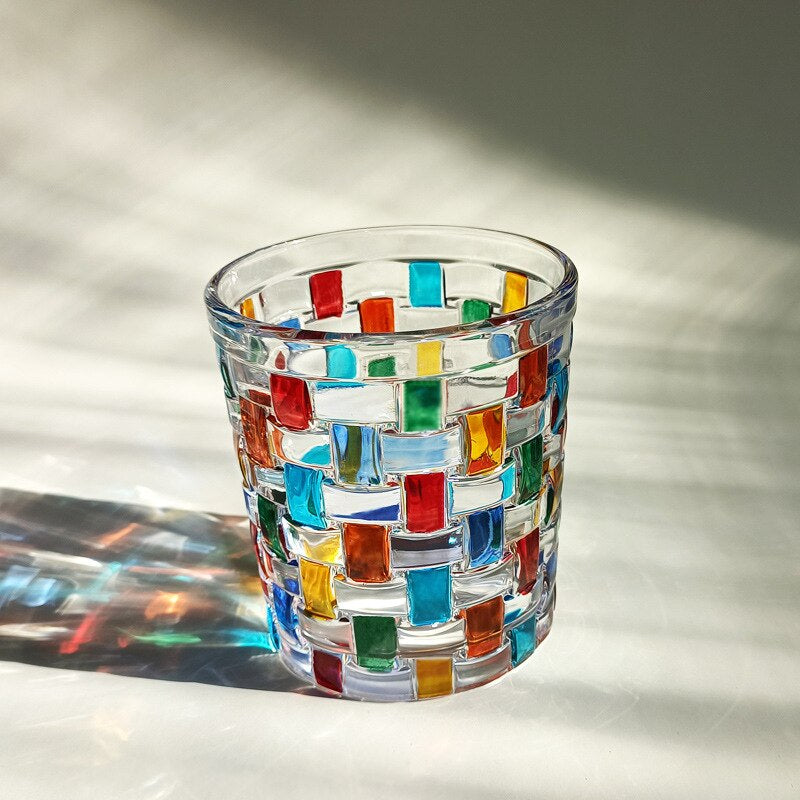 Colored whiskey glass under sunlight | Glasscias