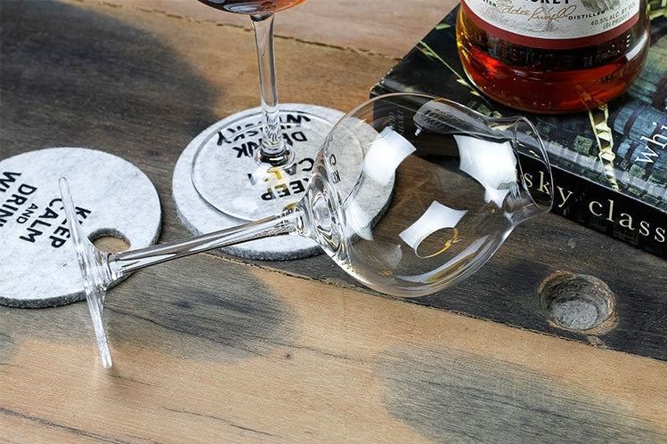 a whiskey tasting glasses at a bar