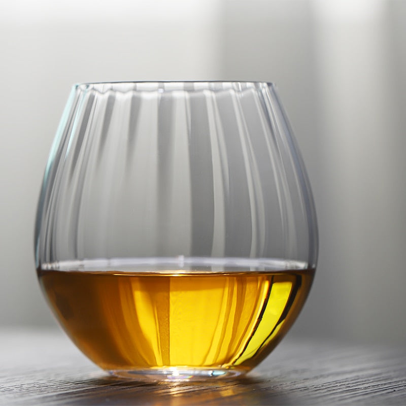 Modern whiskey glass with ribbed design