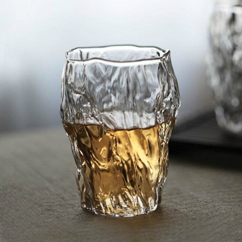 Elegantly crafted whiskey glass resembling nature's tree bark