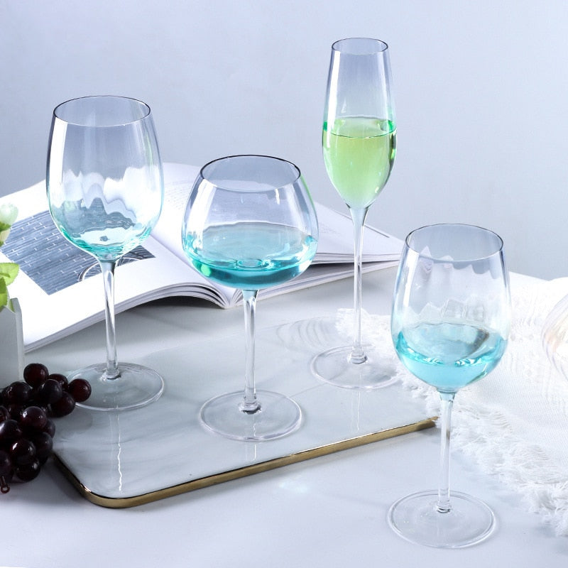 Gradient blue wine glass capturing seascape beauty