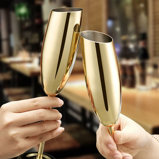 Toasting with Glasscias' gold champagne wine glasses