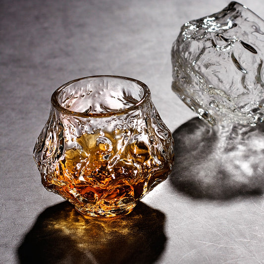 Handmade whiskey glass with a meteorite-inspired shape