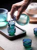 Elegant sake warmer with coral blue hues