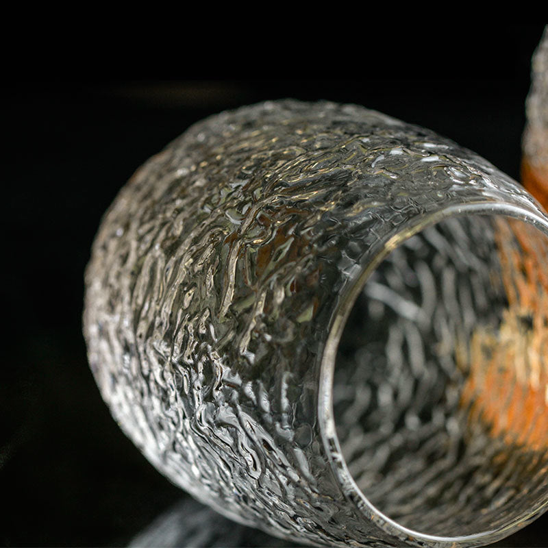Elegant whiskey glass mirroring the intricacy of a silk cocoon.