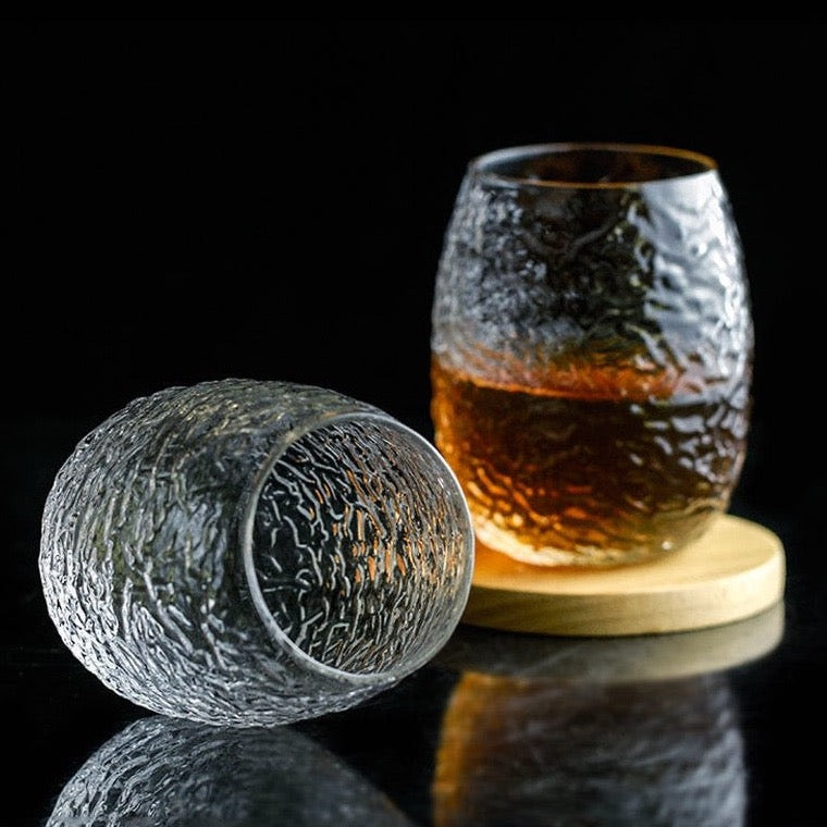 Silk cocoon-shaped whiskey glass with crumpled texture