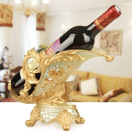 grand european decorative wine bottle holder in gold color