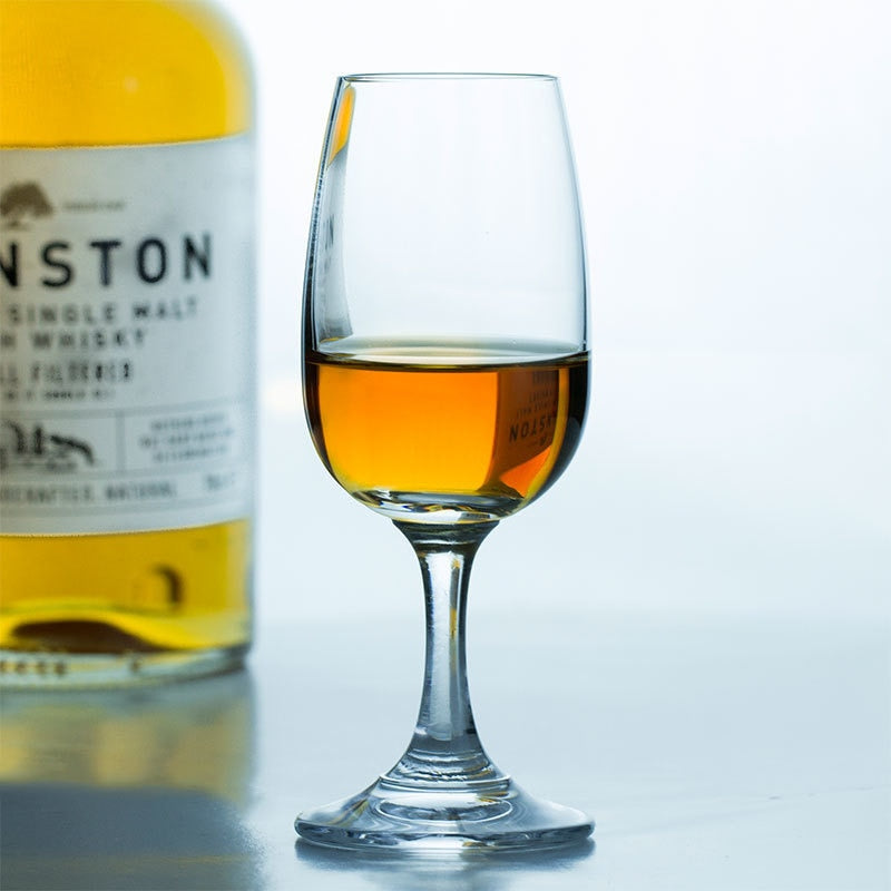 a stemmed whiskey glasses used as whiskey tasting glass