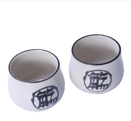 sake cups with japanese charactres