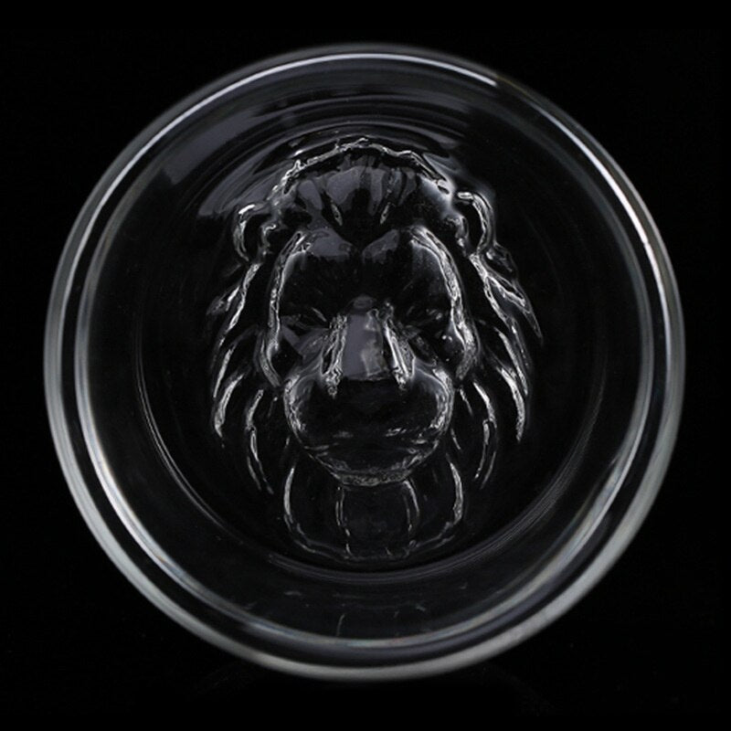 luxury and round whisky glasses with a lion design at the bottom