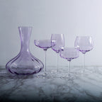 Cheers with the lilac elegance of Glasscias' Lavender Libation glasses