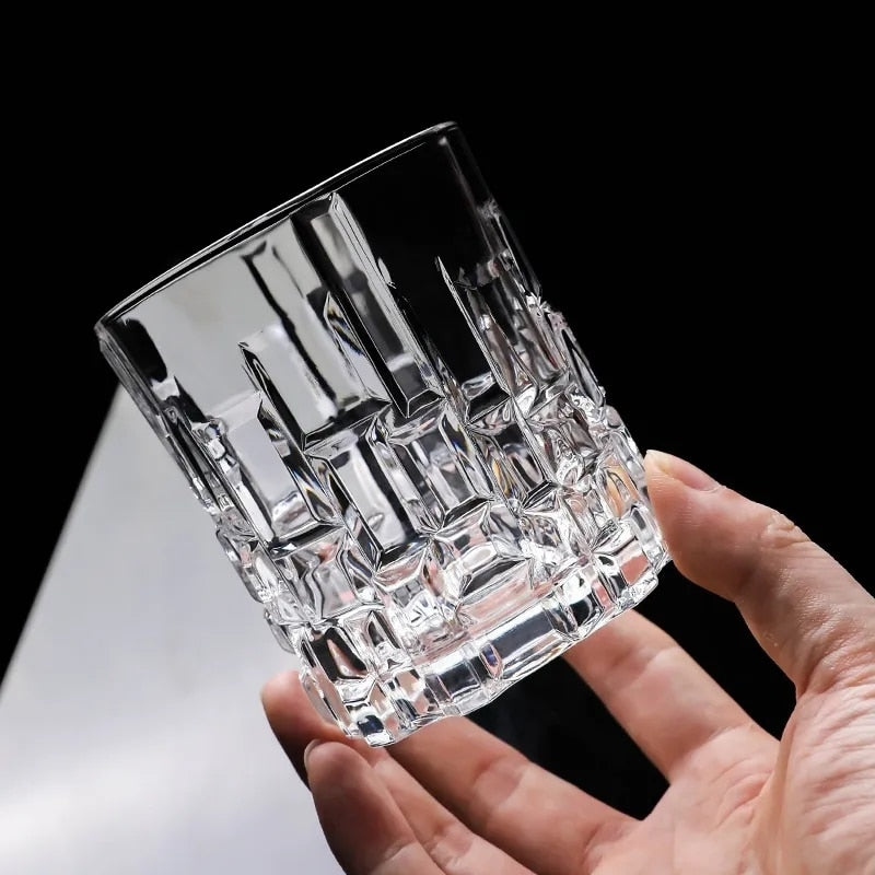 Modern whiskey glass textured with skyscraper-inspired designs