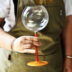 Glasscias' Burgundy Glass with lantern-inspired aesthetics
