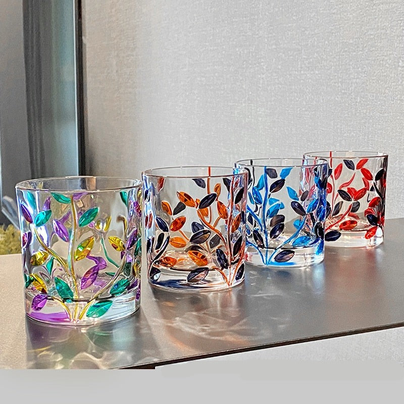 Tree and leaves hand-painted design on whiskey glass