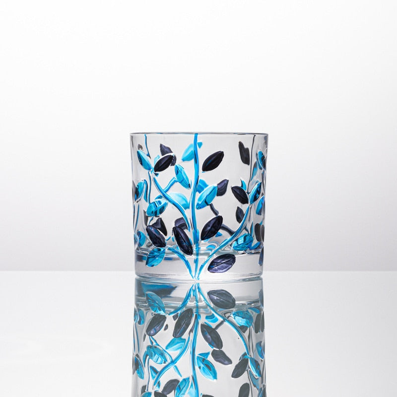 blue painted whiskey glass